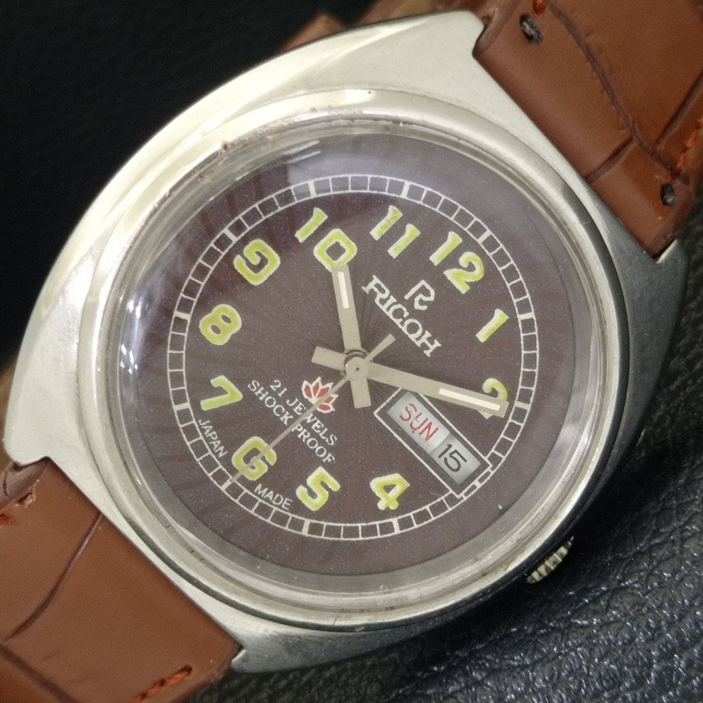 Vintage 1989 Ricoh Automatic Mens Silver Watch WDaydate  Green Accents